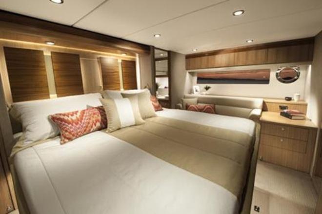 The full-beam master stateroom of the 575 SUV features a king-sized bed and contemporary styling © Riviera Australia